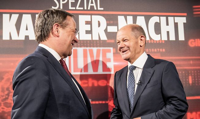 Olaf Scholz (right) and Armin Laschet (left) are tied in exit polls, meaning the identity of the next Chancellor is likely to hinge on coalition talks