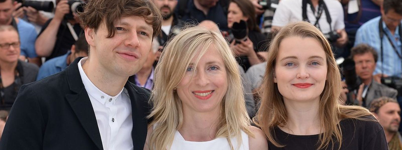 L'acteur allemand Christian Friedel, la réalisatrice autrichienne Jessica Hausner  et l'actrice allemande Birte Schnoink lors du Photocall de "Amour Fou" à Cannes.