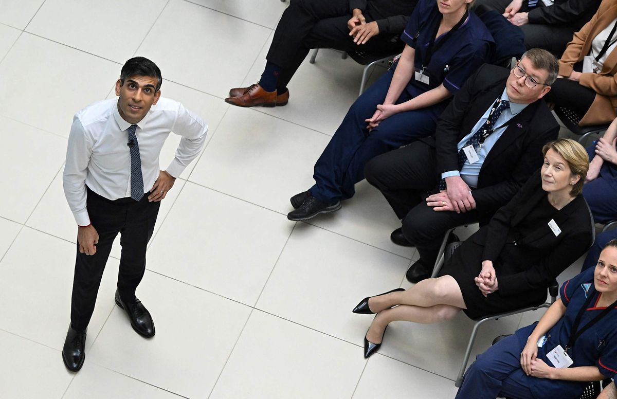 Britain's Prime Minister Rishi Sunak (L) speaks as NHS Chief Executive Amanda Pritchard  (R) listens during a Q&A at Teesside University in Darlington, north-east England, on 30 January, 2023