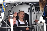 Swedish climate activist Greta Thunberg, 16, arrives in the US after a 15-day journey crossing the Atlantic in the Malizia II, a zero-carbon yacht, on August 28, 2019 in New York. - "Land!! The lights of Long Island and New York City ahead," she tweeted early Wednesday. She later wrote on Twitter that her yacht had anchored off the entertainment district of Coney Island in Brooklyn to clear customs and immigration. (Photo by Johannes EISELE / AFP)