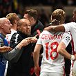 Monaco's Portuguese coach Leonardo Jardim (2ndL) celebrates after Monaco's French forward Valere Germain (C) scored his team's third goal during the UEFA Champions League 2nd leg quarter-final football match AS Monaco v BVB Borussia Dortmund on April 19, 2017 at the Louis II stadium in Monaco.  / AFP PHOTO / BORIS HORVAT