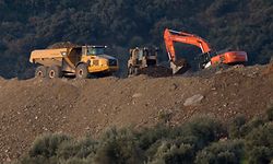 Rescue workers continue efforts to find a boy who fell down a well in Totalan in southern Spain on January 17, 2019. - Rescuers racing to save a two-year-old boy who fell down a well in southern Spain have found several strands of his hair, authorities said, raising hopes of finding the toddler whose fate has gripped the nation for days. It is the first confirmation that Julen is down the 110-metre (360-foot) deep shaft after family members said he tumbled in while playing as his parents had lunch nearby. (Photo by JORGE GUERRERO / AFP)